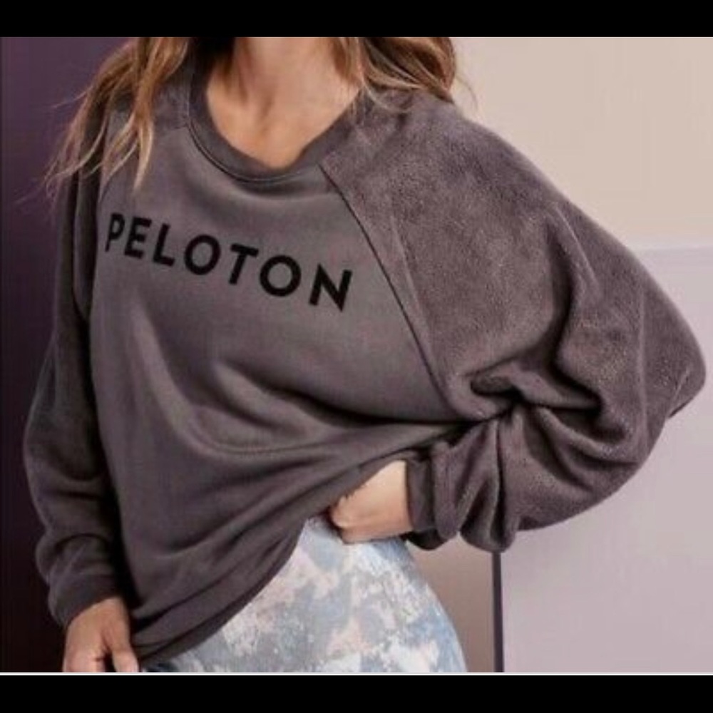 Lightly used Peloton purple/grey sweatshirt Sz M